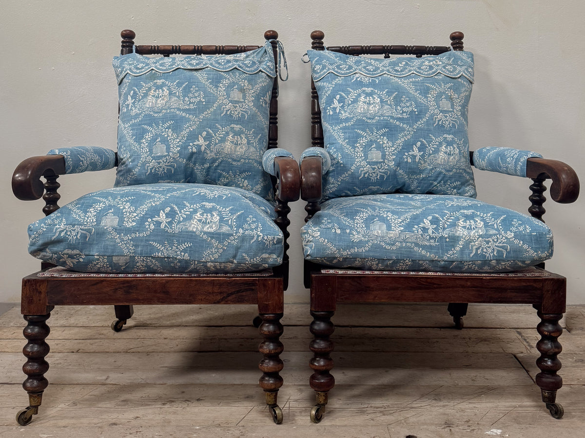 A Matched Pair of Mid 19th Century Simulated Rosewood Open Armchairs
