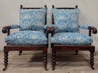 A Matched Pair of Mid 19th Century Simulated Rosewood Open Armchairs