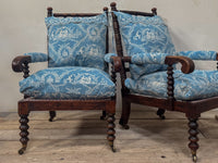 A Matched Pair of Mid 19th Century Simulated Rosewood Open Armchairs