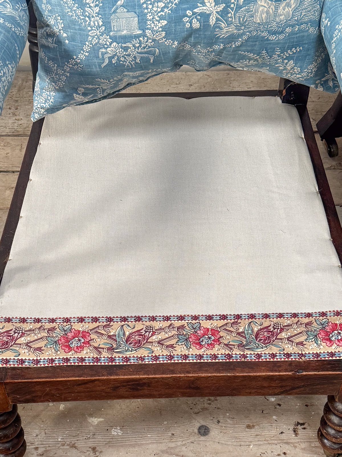 A Matched Pair of Mid 19th Century Simulated Rosewood Open Armchairs