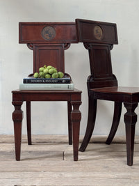 A Pair of Early Regency Mahogany Hall Chairs
