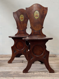 A Pair of George III Mahogany Sgabello Hall Chairs