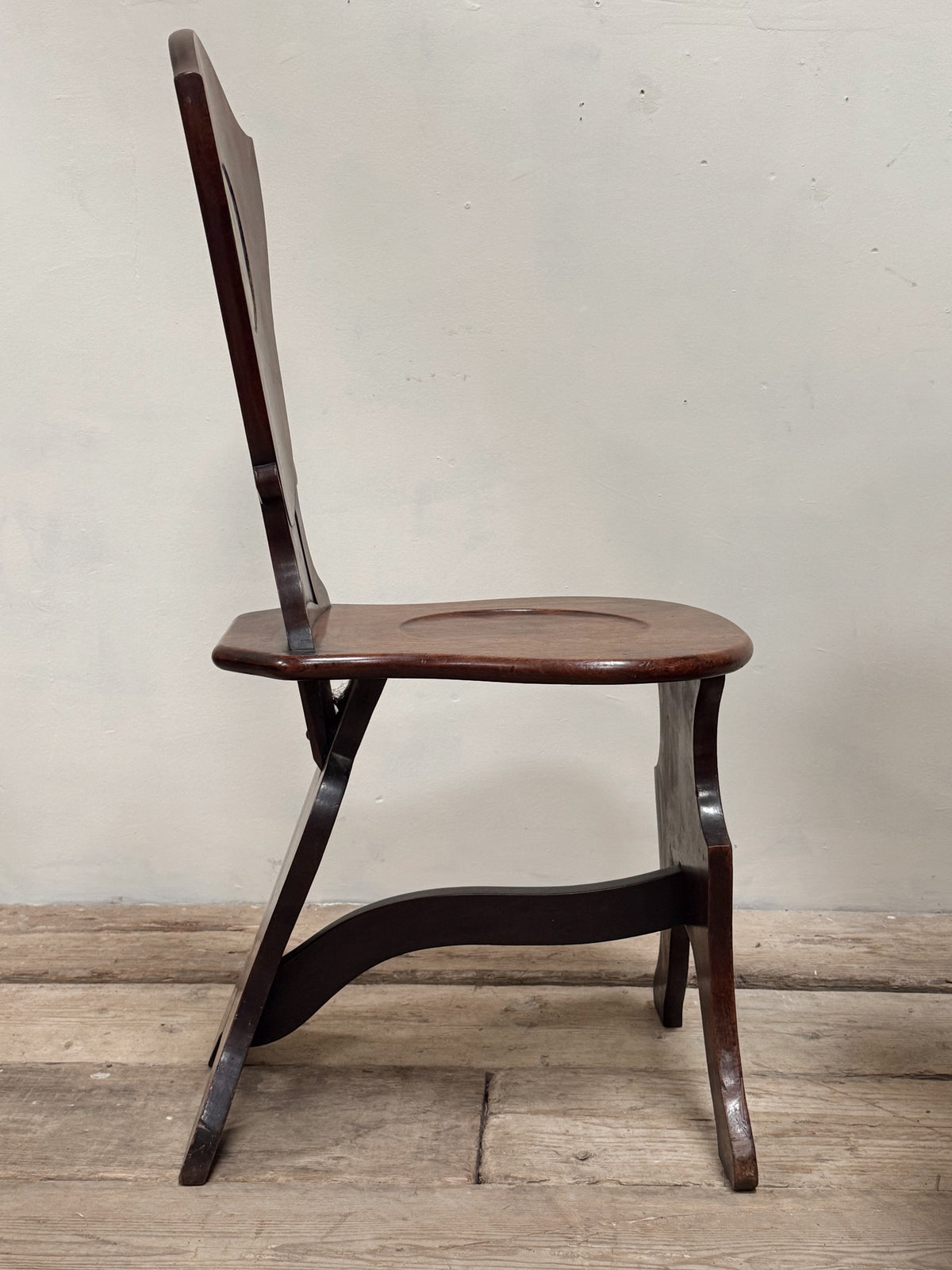 A Pair of George III Mahogany Sgabello Hall Chairs