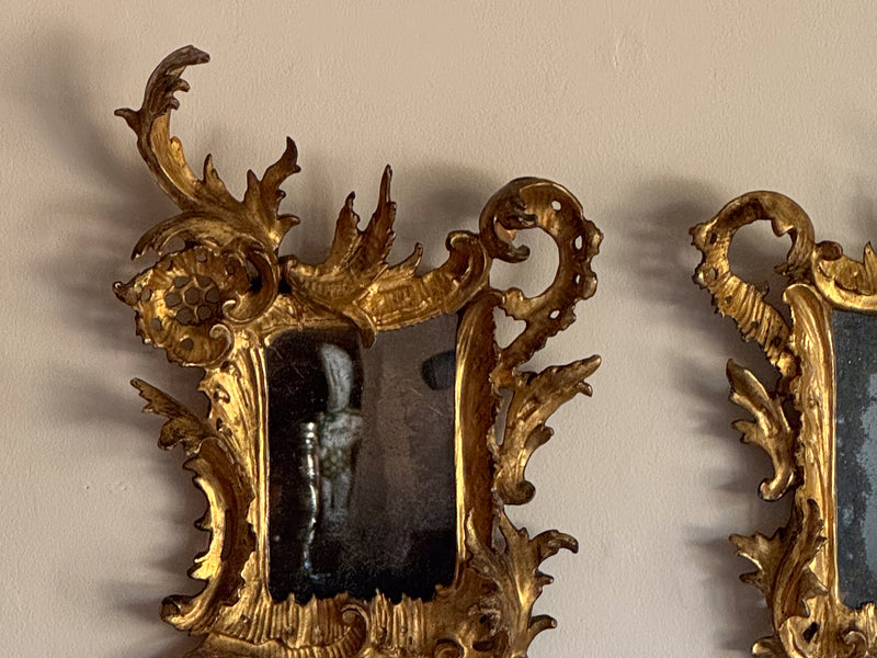 A Pair of Diminutive George III Giltwood Rococo Mirrors