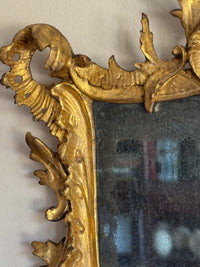 A Pair of Diminutive George III Giltwood Rococo Mirrors