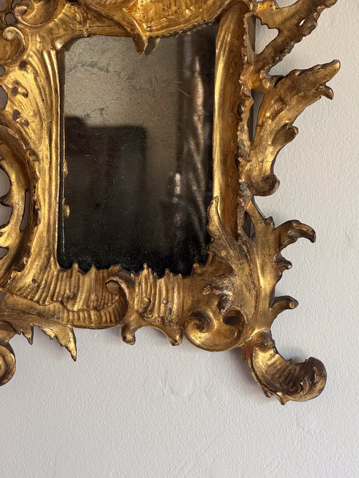 A Pair of Diminutive George III Giltwood Rococo Mirrors