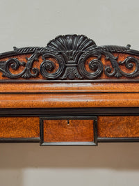 A Late Regency Amboyna & Ebony Pedestal Side Board