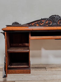 A Late Regency Amboyna & Ebony Pedestal Side Board