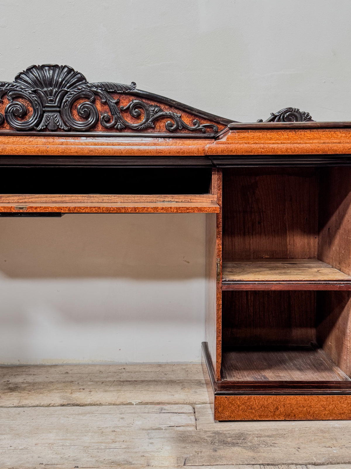 A Late Regency Amboyna & Ebony Pedestal Side Board