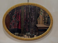 A Mid 19th Century Giltwood Oval Mirror