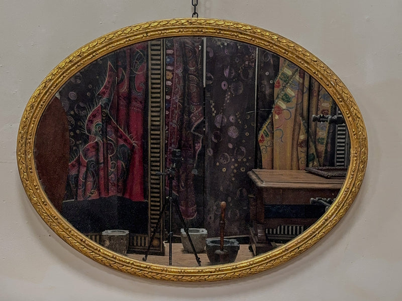 A Mid 19th Century Giltwood Oval Mirror