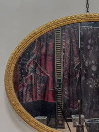 A Mid 19th Century Giltwood Oval Mirror