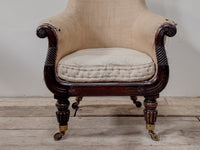 A Late Regency Bergeré Library Chair attributed to Gillows
