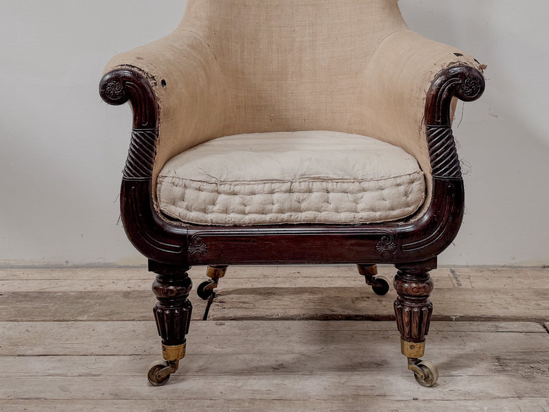 A Late Regency Bergeré Library Chair attributed to Gillows