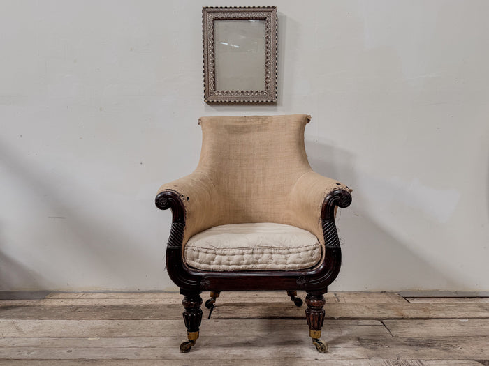 A Late Regency Bergeré Library Chair attributed to Gillows