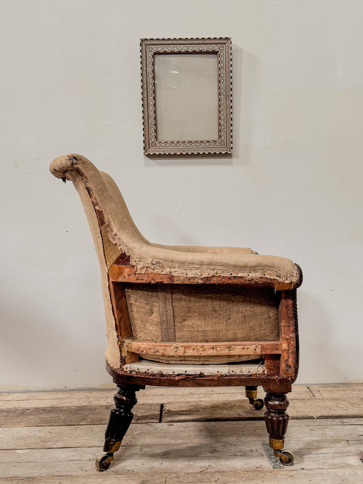 A Late Regency Bergeré Library Chair attributed to Gillows