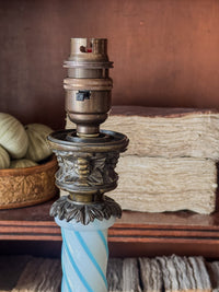 A Late 19th Century Opaline Glass and Bronze Lamp