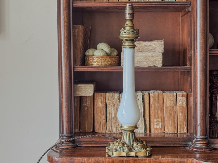 A Late 19th Century Opaline Glass and Brass Lamp