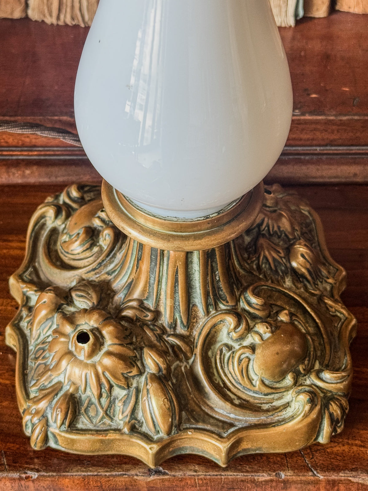 A Late 19th Century Opaline Glass and Brass Lamp