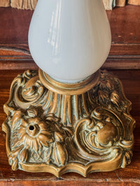 A Late 19th Century Opaline Glass and Brass Lamp
