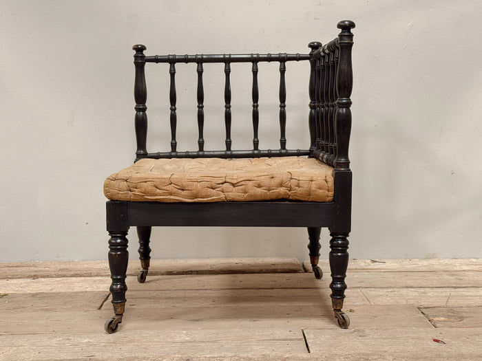 An Early 19th Century Ebonised Corner Chair