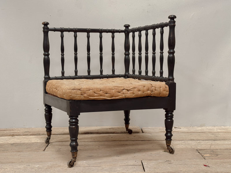An Early 19th Century Ebonised Corner Chair