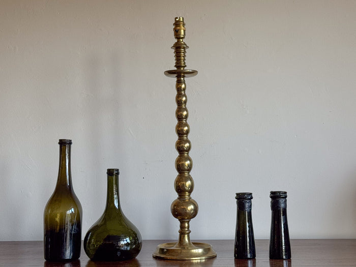 An Early 20th Century Brass Bobbin Lamp