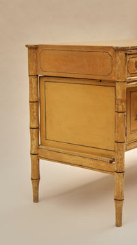 A Late Regency Faux Bamboo Painted Cabinet
