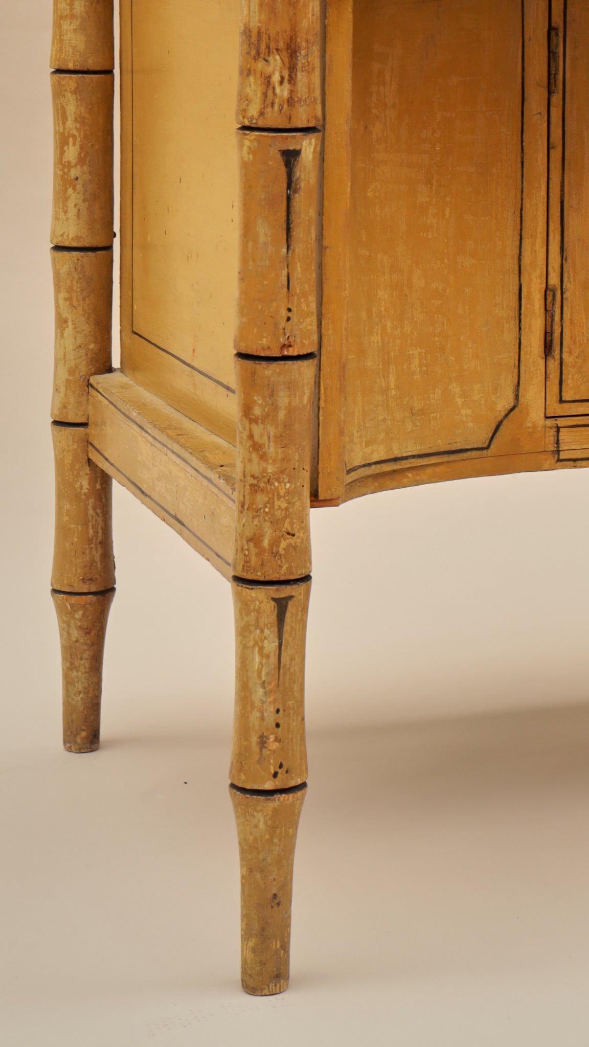 A Late Regency Faux Bamboo Painted Cabinet